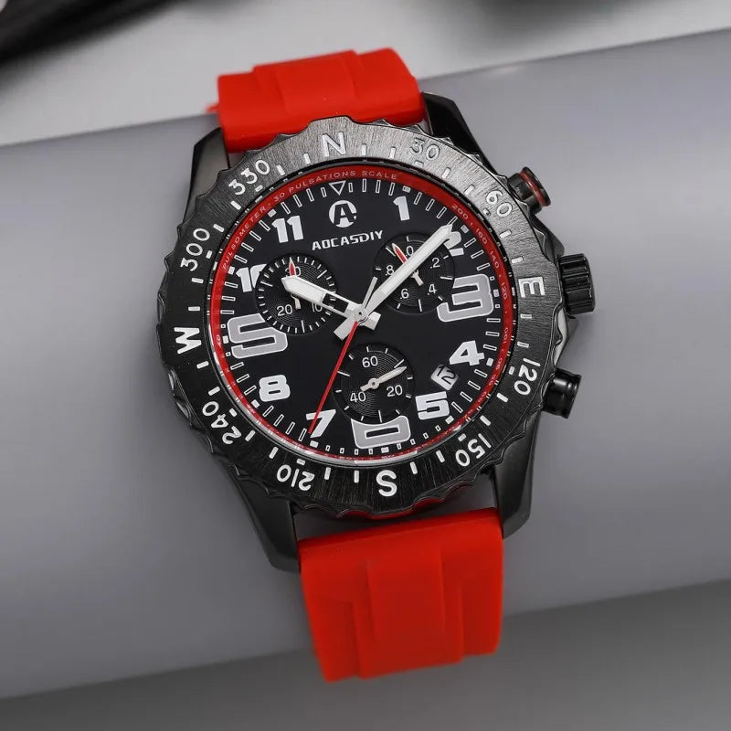 Wristwatch with red strap and black dial on a gray background