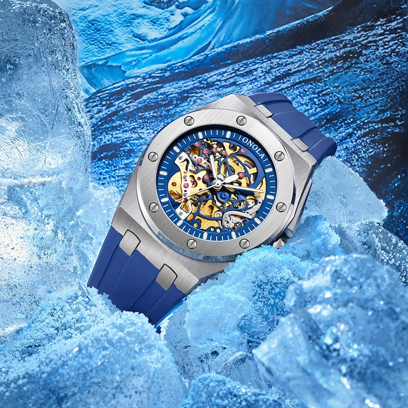 Blue watch with a detailed face on a blue ice background