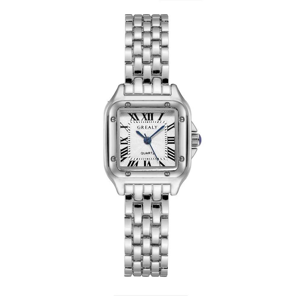 Silver watch with a white face on a white background