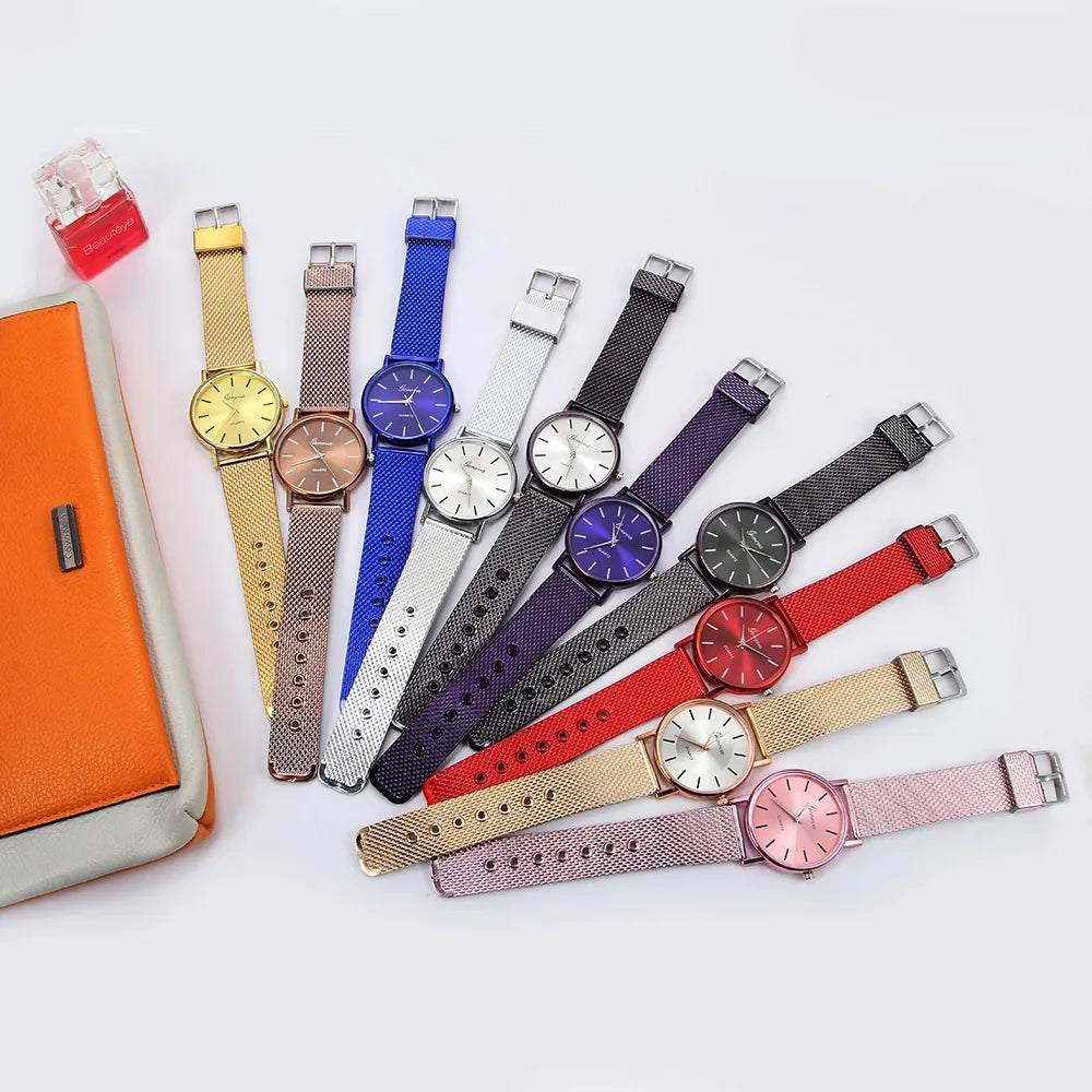 Collection of colorful watches with various band colors on a white background