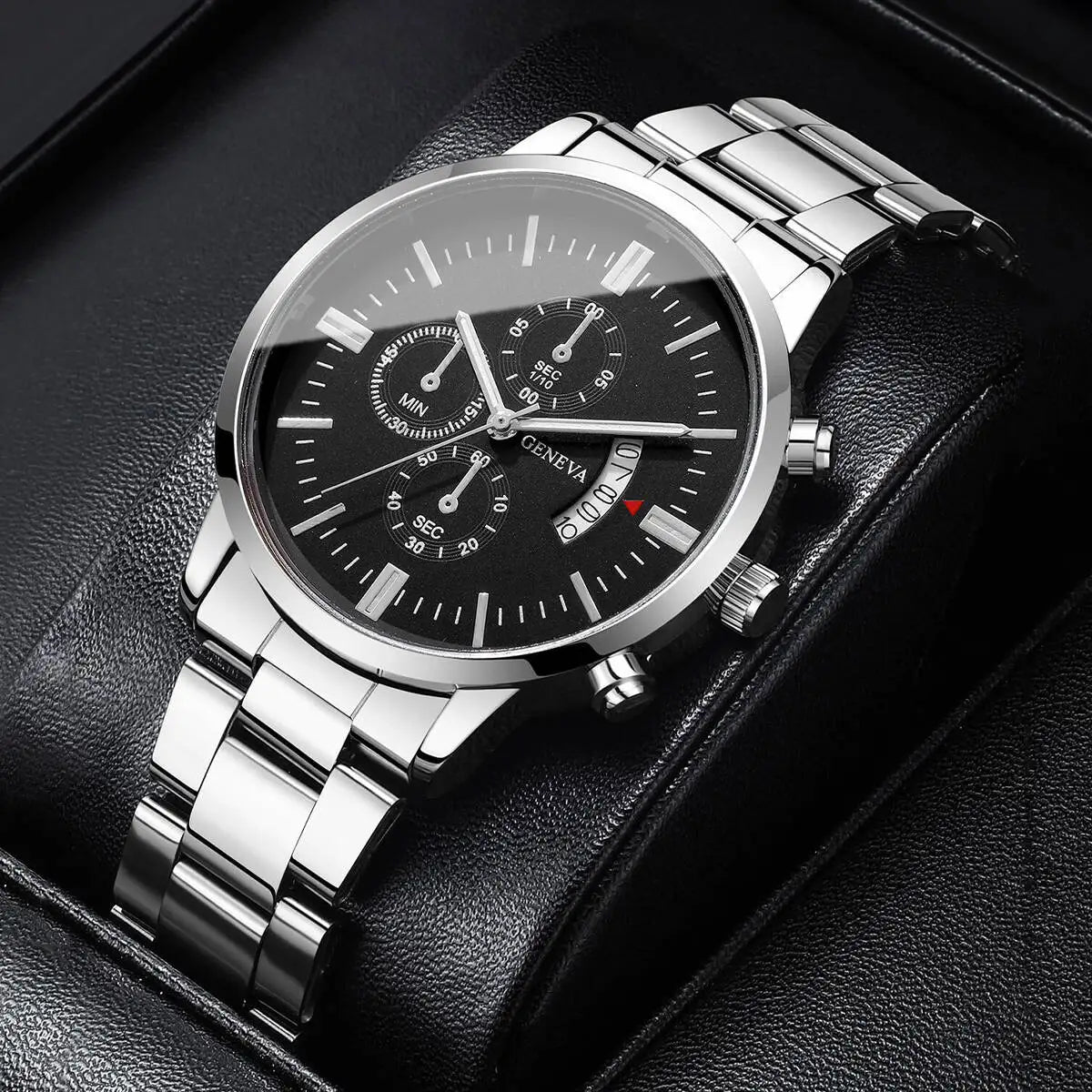 Silver wristwatch with black dial on a dark background
