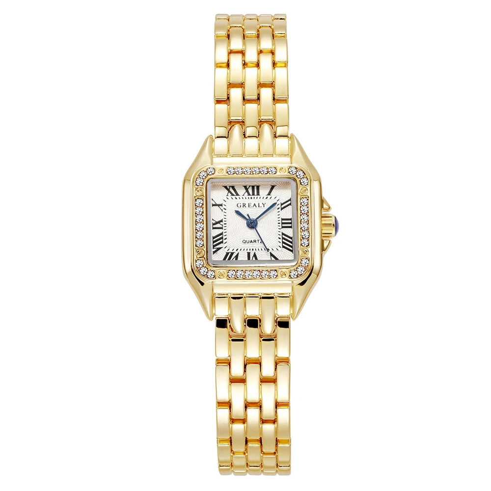 Gold wristwatch with a square face on a white background