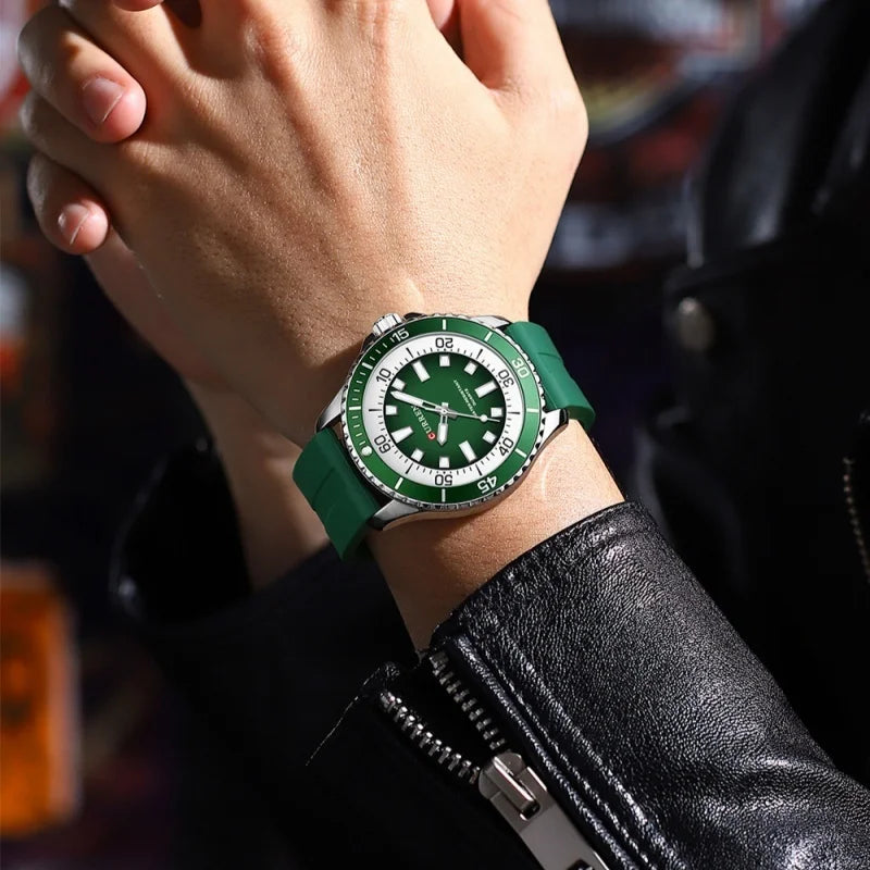 Green watch on a wrist with a blurred background