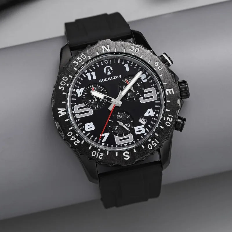 Black wristwatch with detailed face on a gray background