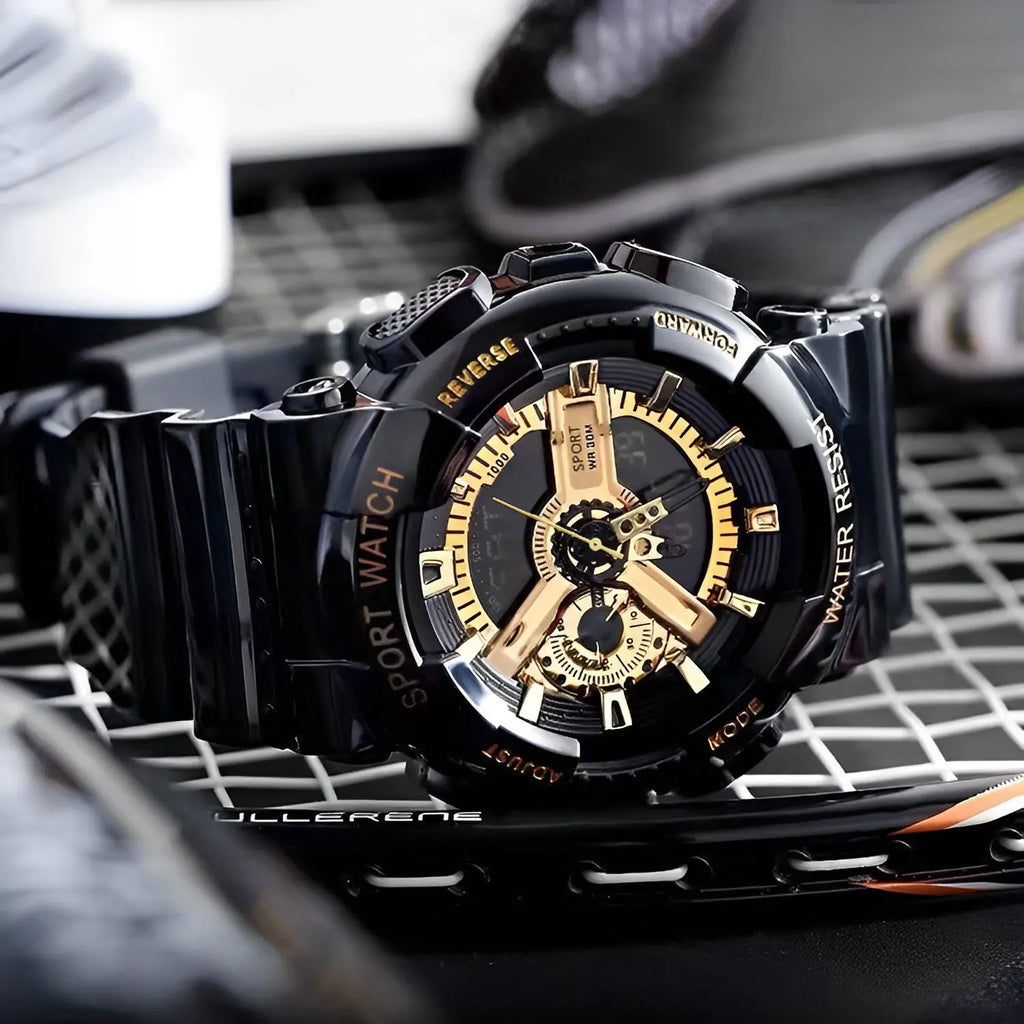 Black and gold watch with detailed face on a textured surface