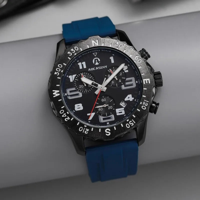 Wristwatch with blue strap and black dial on a gray surface