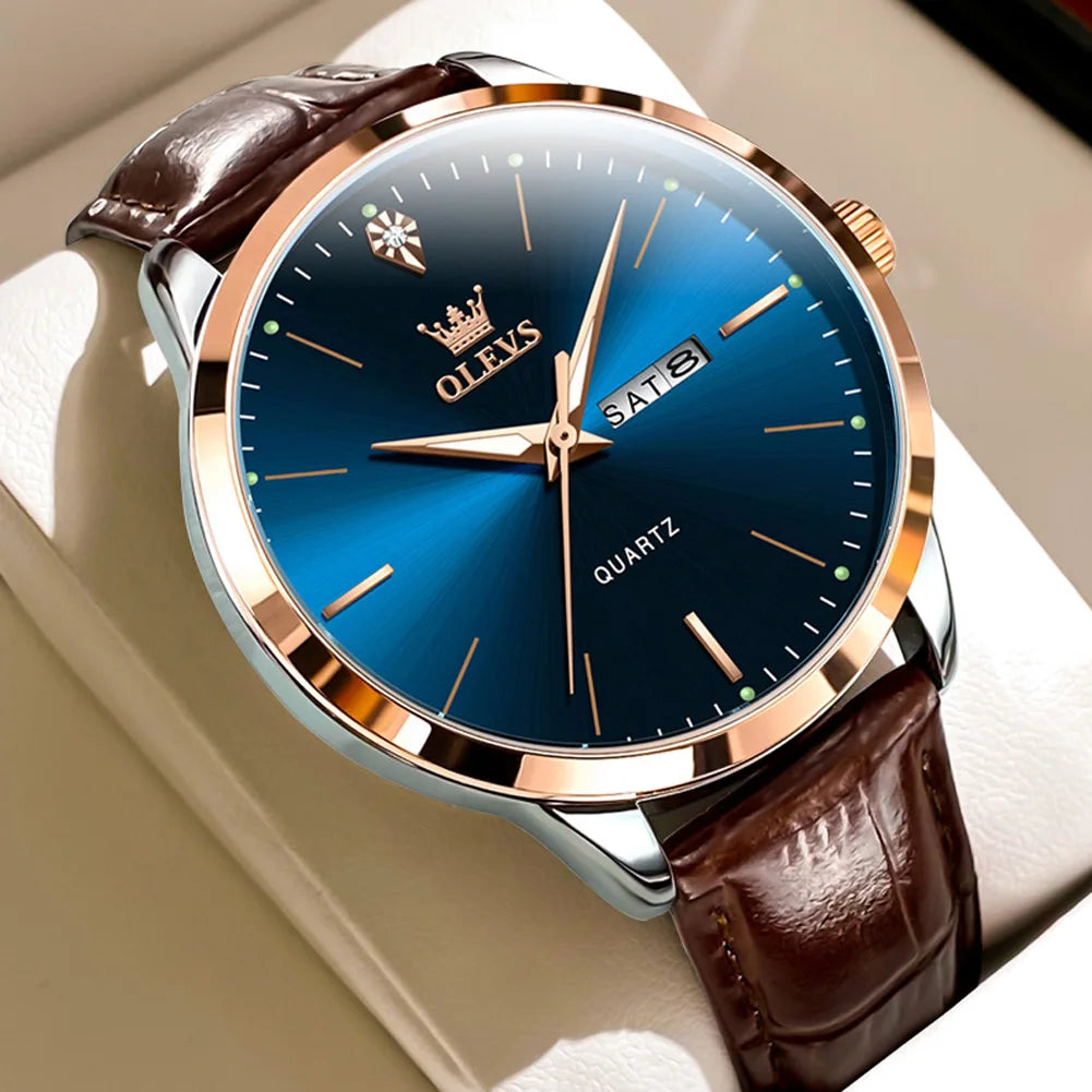 Watch with blue dial and brown leather strap on a white surface