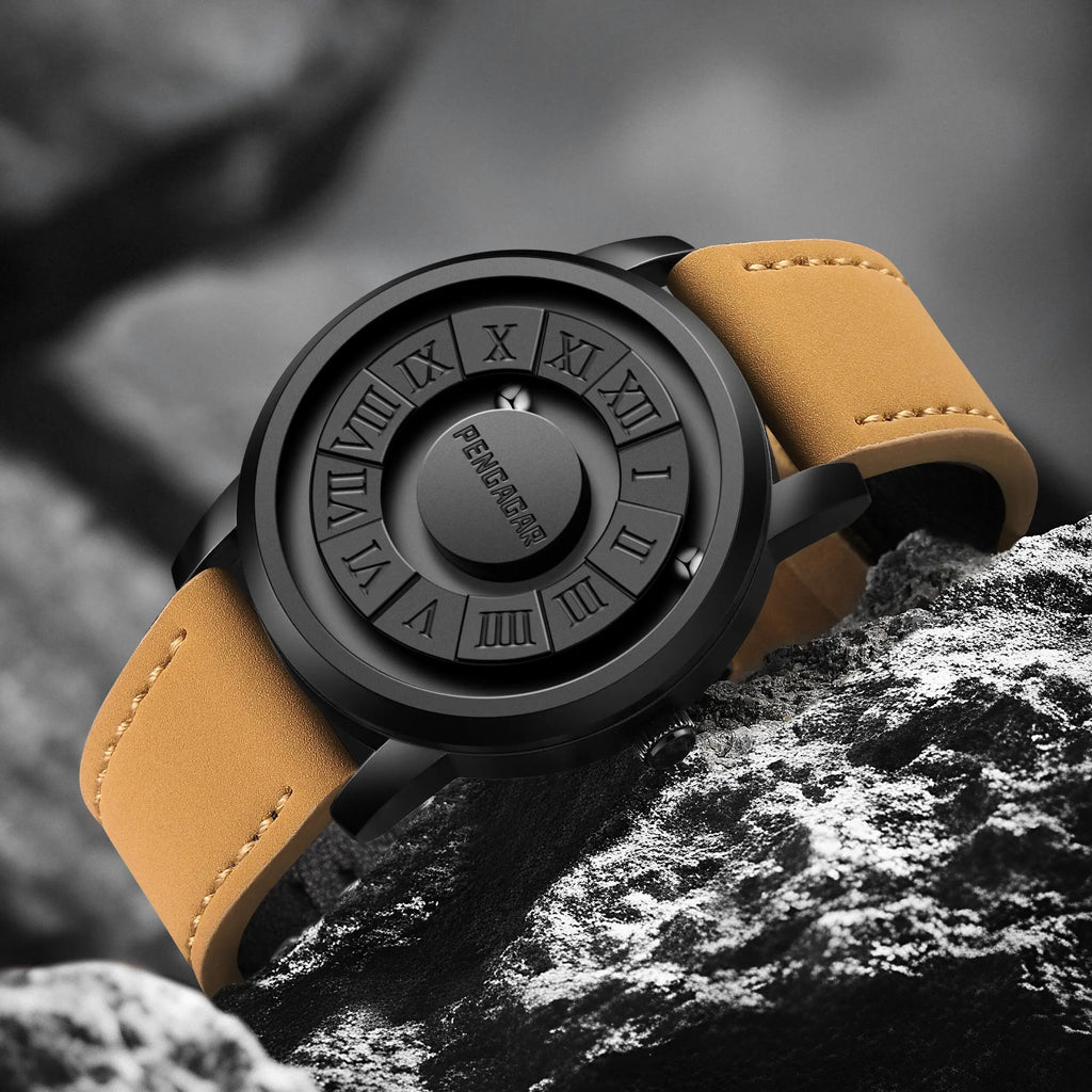 Wristwatch with a brown leather strap and black dial on a rocky surface