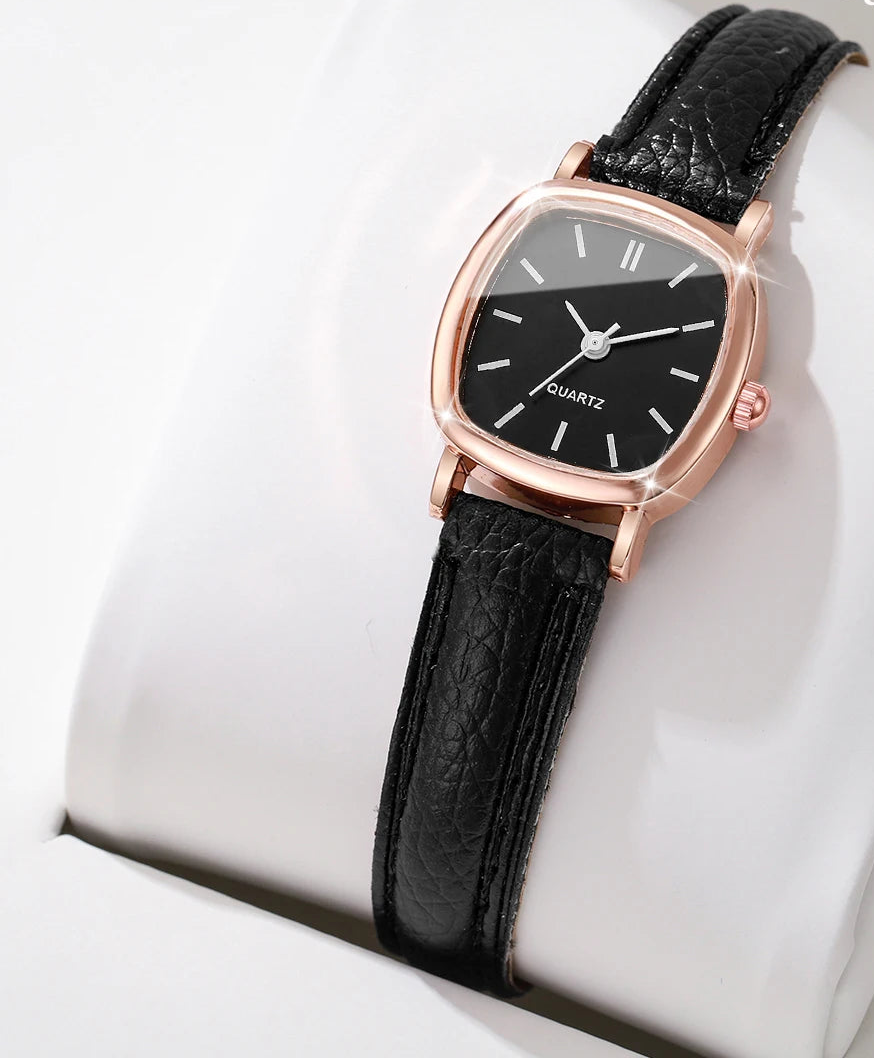 Black wristwatch with rose gold case on a white cushion, 'Boxes not include' text overlay.
