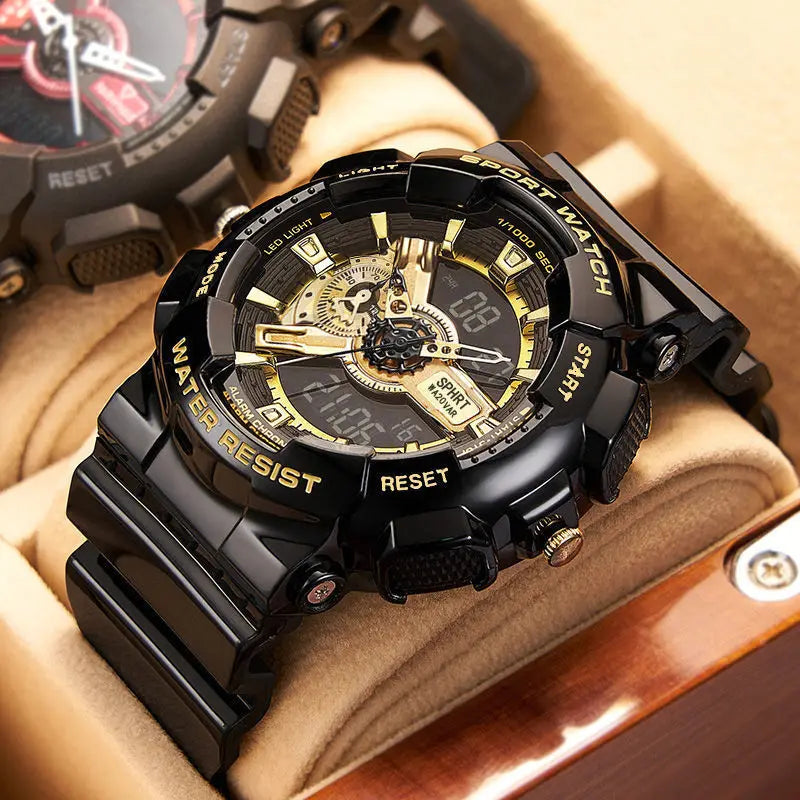 Black and gold wristwatch with detailed face on a wooden surface