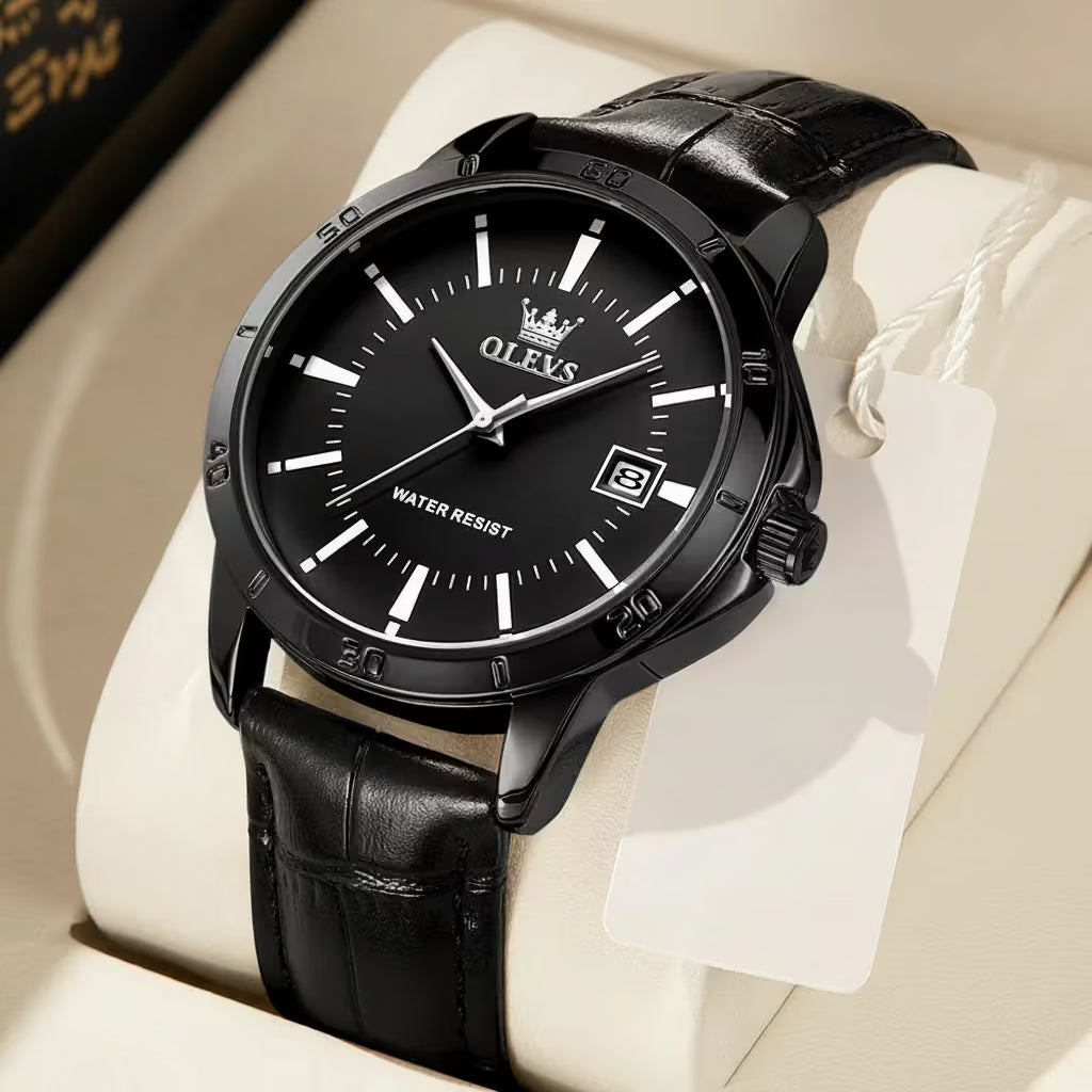 Black wristwatch with Olevs brand on a white surface