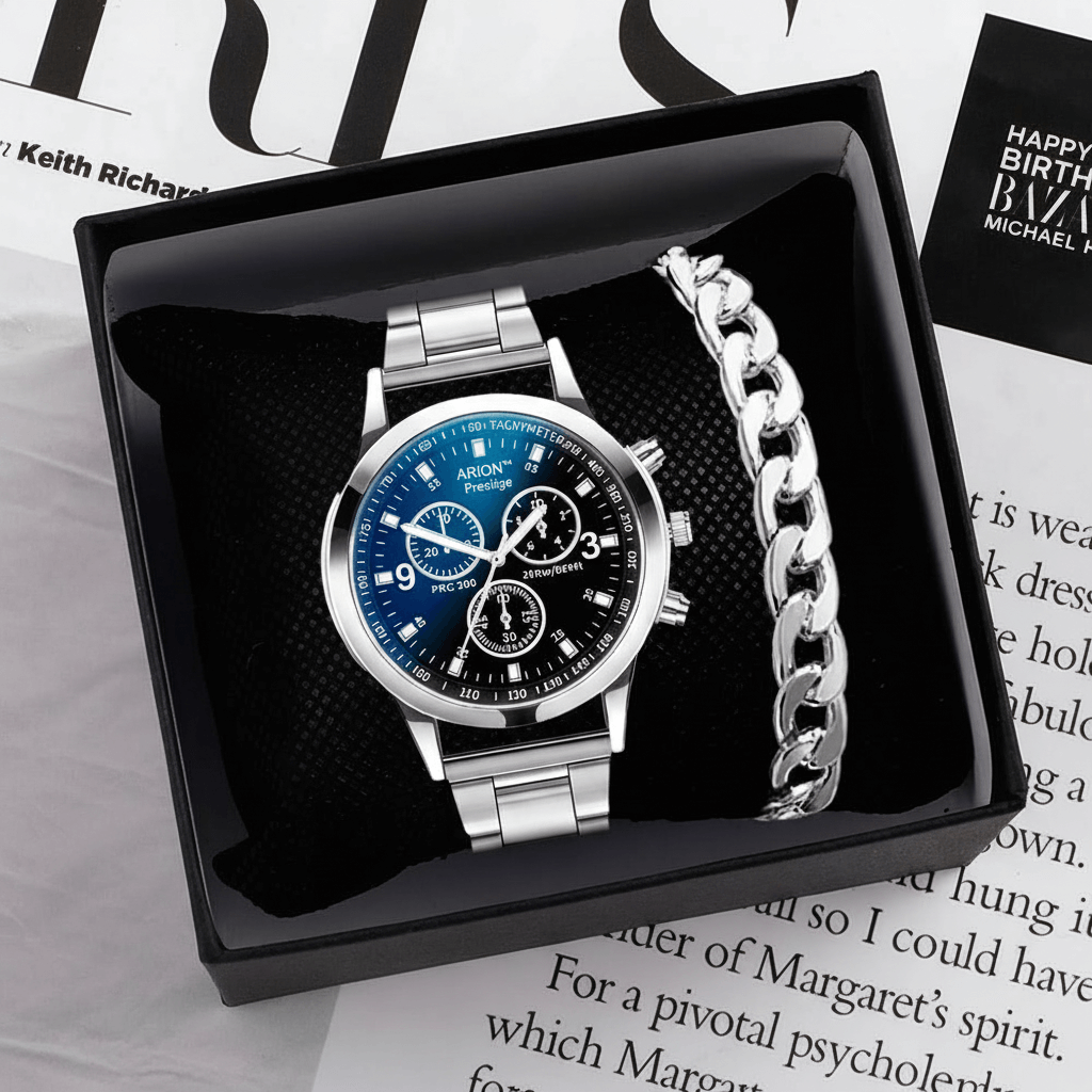 Silver watch with blue face in a black box on a magazine background